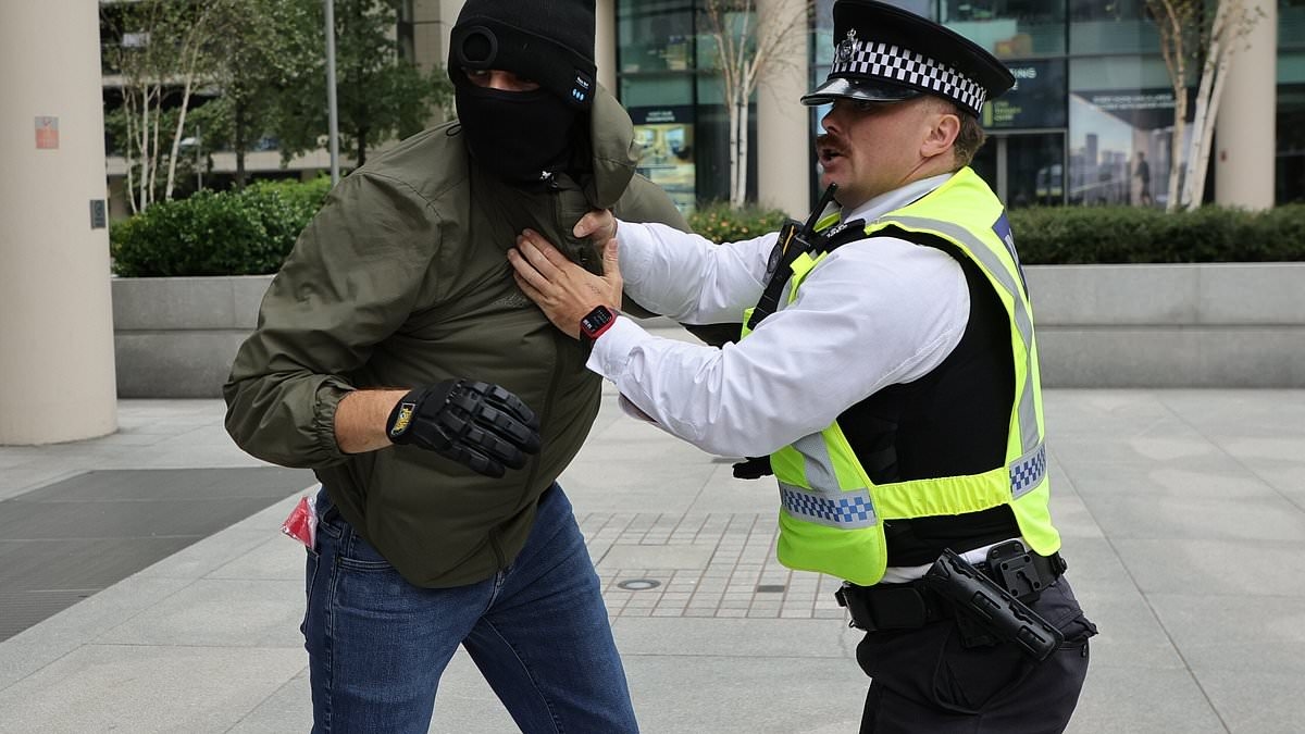 Peaceful pink-wearing mothers' migrants protest turns to violence: Masked men hijack demonstration, trying to rush gates at asylum seekers hotel before police crack down