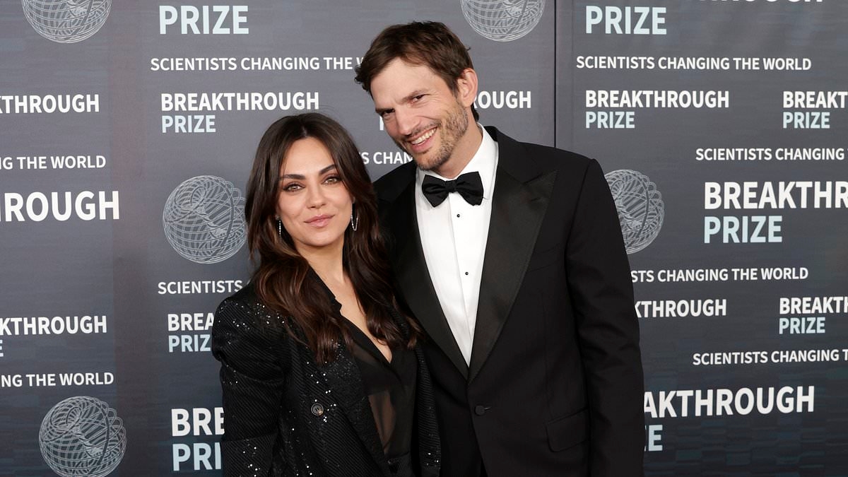 Ashton Kutcher and Mila Kunis bust boy band-worthy moves at Backstreet Boys concert