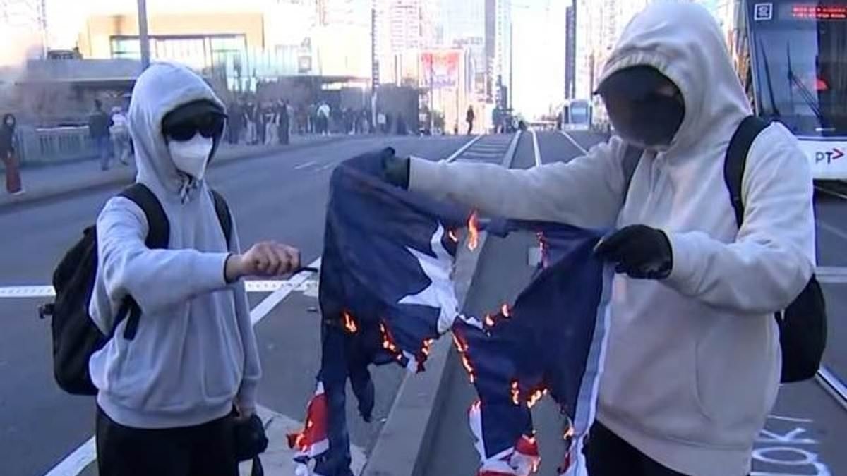 Shocking moment the Australian flag is set on fire during protest in support of Palestine