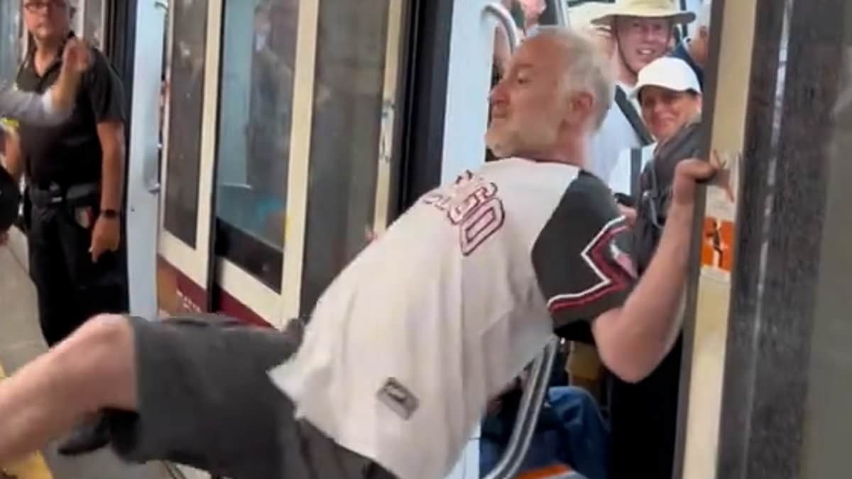 Shocking moment thug lashes out at tourists trying to board Italian subway train... before their brilliant response
