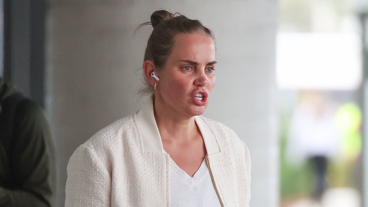 Sore head? Jelena Dokic goes makeup-free and appears tired as she arrives home in Melbourne after celebrating her first Logie win