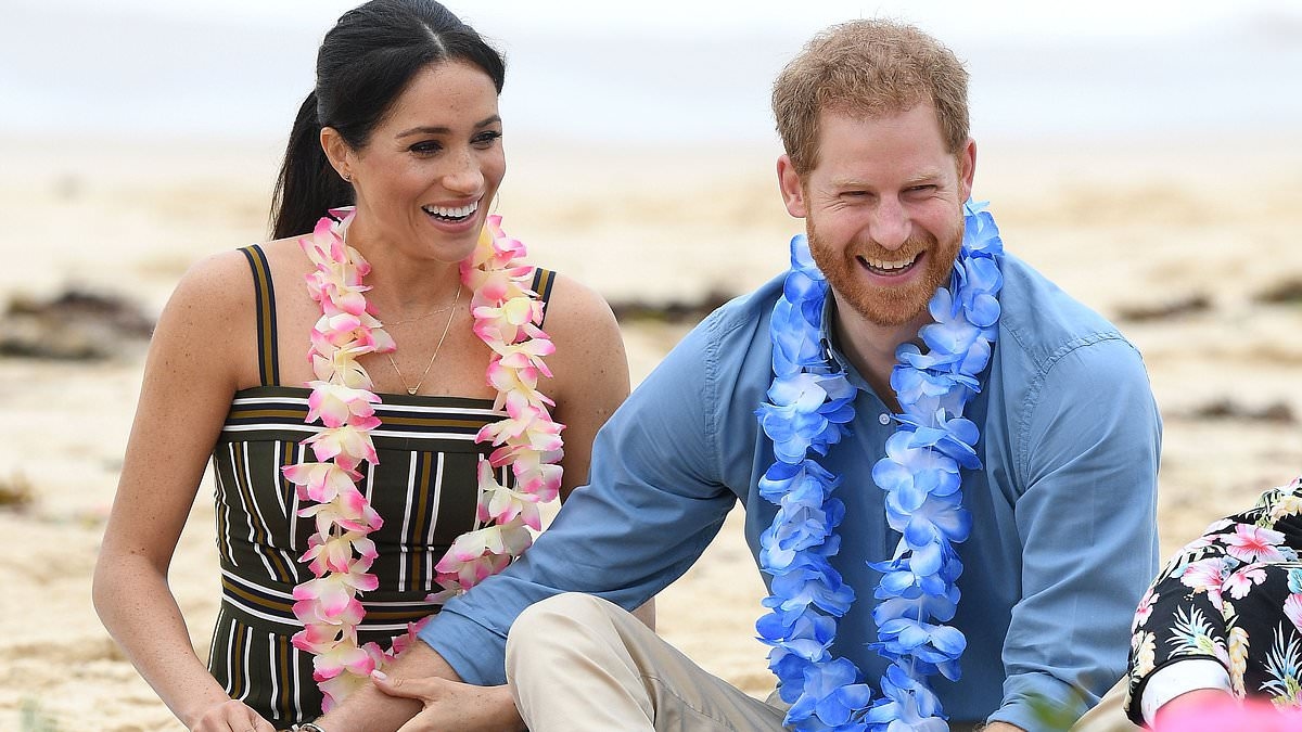 Surf's up, Archie! Prince Harry's son, six, follows in his footsteps as he embraces the California lifestyle and joins a large group of children for a day on the beach and a lesson in wave riding watched by his proud parents