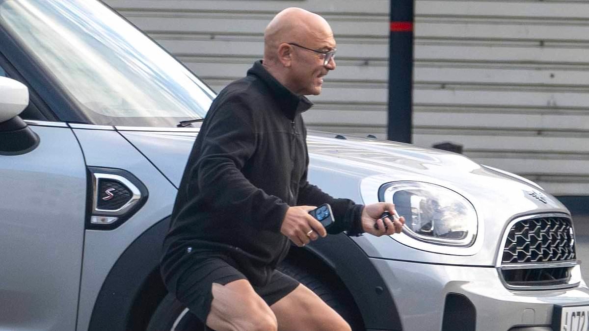 Gregg Wallace, 60, bizarrely does squats outside the gym as he continues to plug his personal training business - after hitting out at backlash over his autism charity appointment