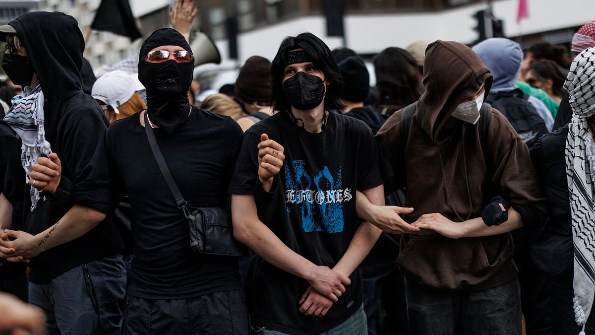 How resurgent Antifa brought violence to the streets of London by hijacking Corbynite and socialist 'pro-migrant' demonstration before clashing with anti-asylum seeker protesters