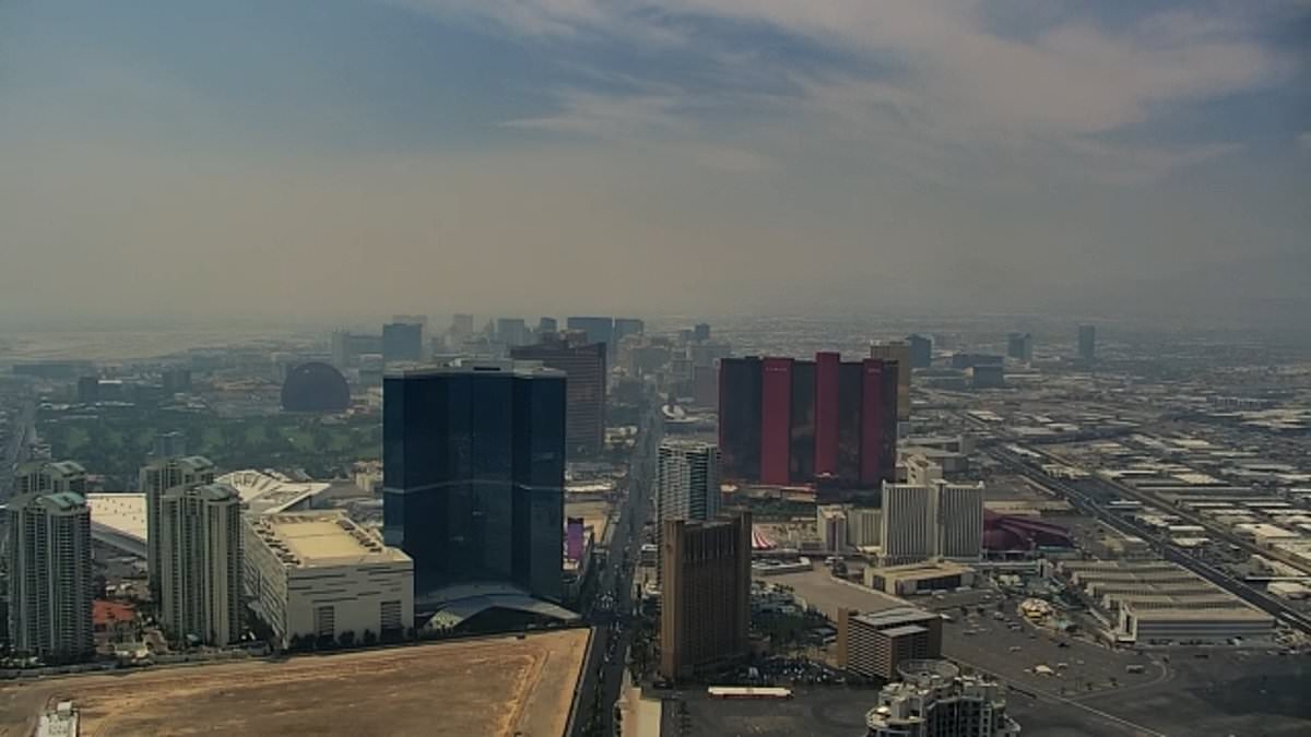 Fire near Las Vegas blankets iconic Strip in smoke as tourists continue to shun 'dying' city