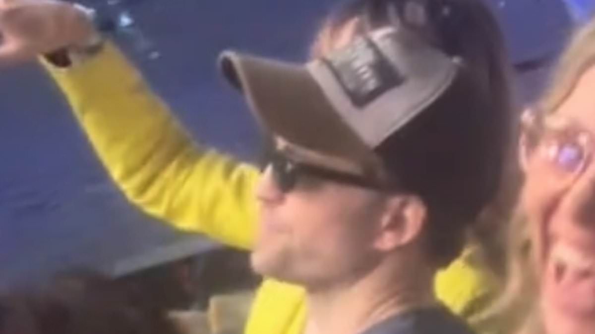 Oasis fans in meltdown as they spot unlikely Hollywood heartthrob and his famous partner in the crowds after shunning VIP tickets at Wembley gig