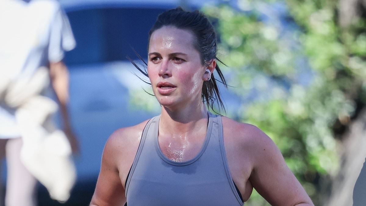 Nine star Danika Mason shows off her fit figure in activewear as she takes a run in Centennial Park - after blow to her long-distance romance with rugby player Liam Knight