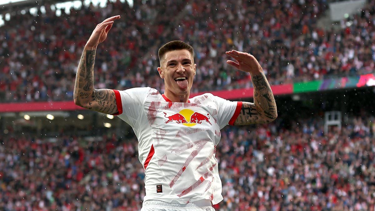 Man United 'finally make their move for Benjamin Sesko as they lodge first official bid' and look to beat Newcastle to RB Leipzig striker