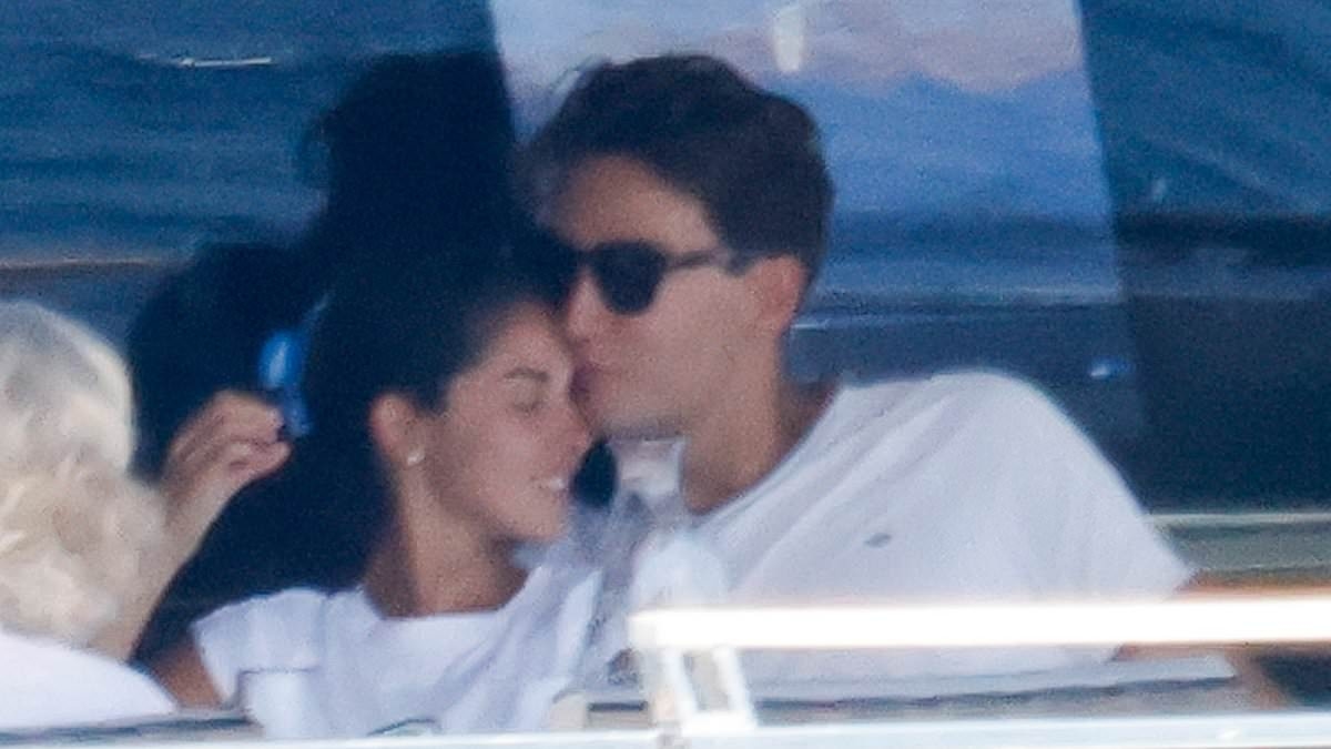 Formula 1's George Russell shares a steamy smooch with his bikini-clad girlfriend Carmen Montero Mundt on romantic Italian yacht trip