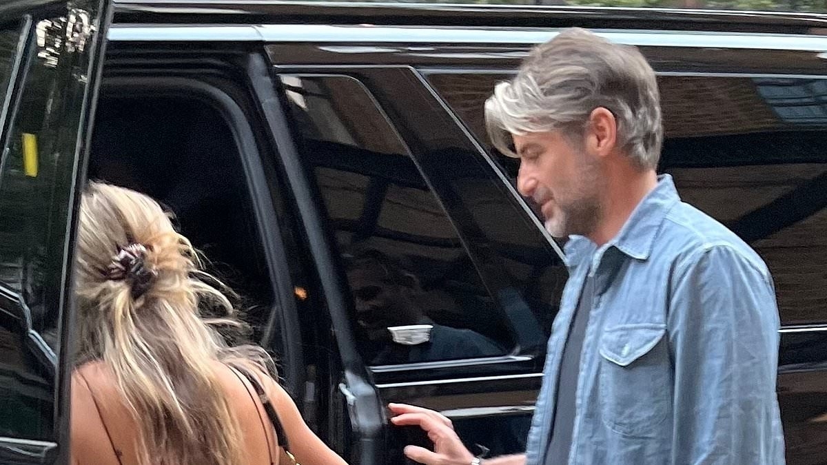 Jennifer Aniston's new man sparks concern as he's seen hobbling on a date with her A-list pals