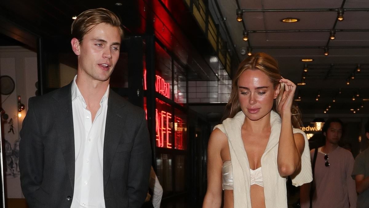 Kimberley Garner stuns in a satin cream co-ord as she departs star-studded Materialists gala screening with handsome male friend