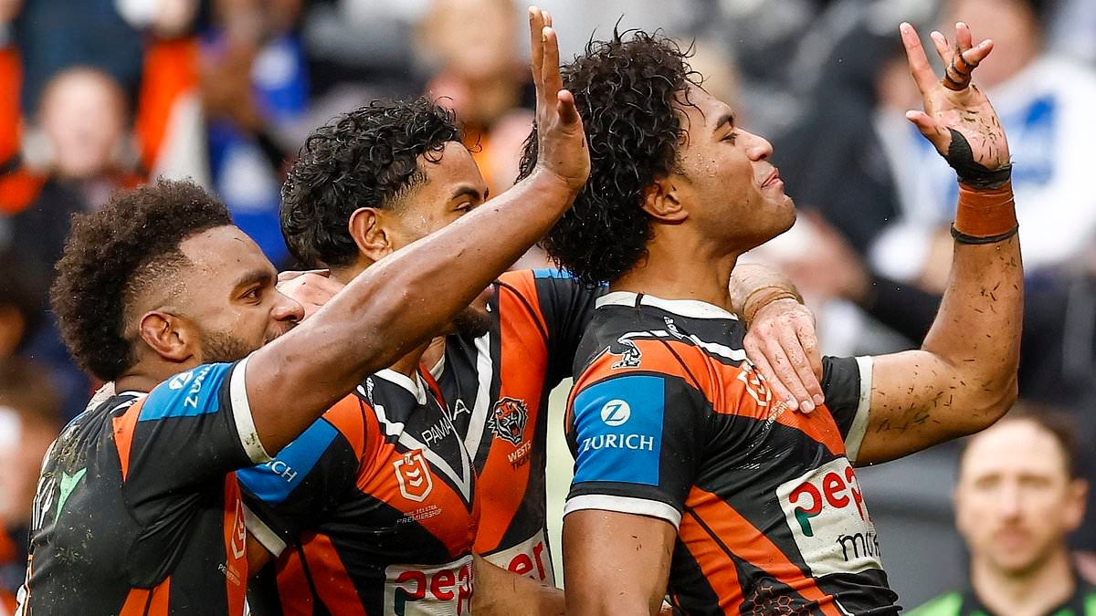 Footy star gets punished by NRL for giving fans the 'Arabic middle finger' - as a shock photos show why fans think the league has got it wrong