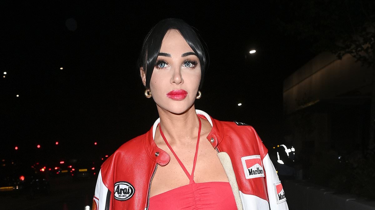 Tulisa flashes her toned midriff in a red crop top and thigh high leather boots at Drake's concert - after death of her famous father Steve Contostavlos