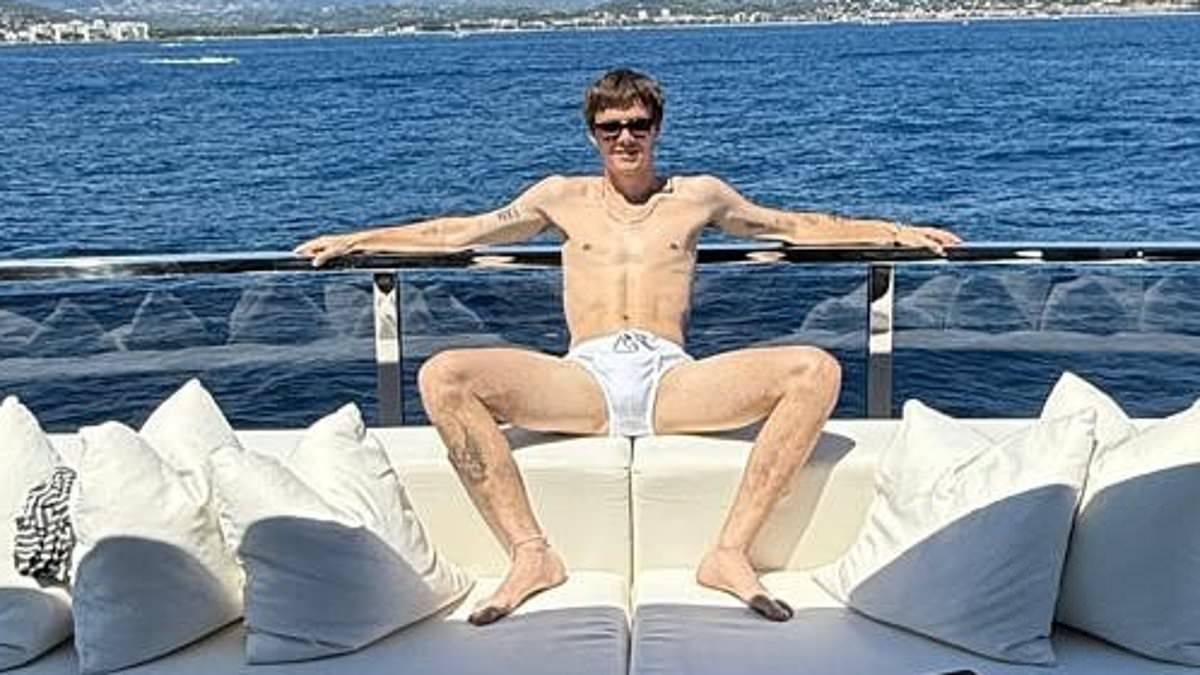 Cruz Beckham shares a snap of his green short shorts as he flaunts his love of the item - after THAT cheeky display in his Speedos