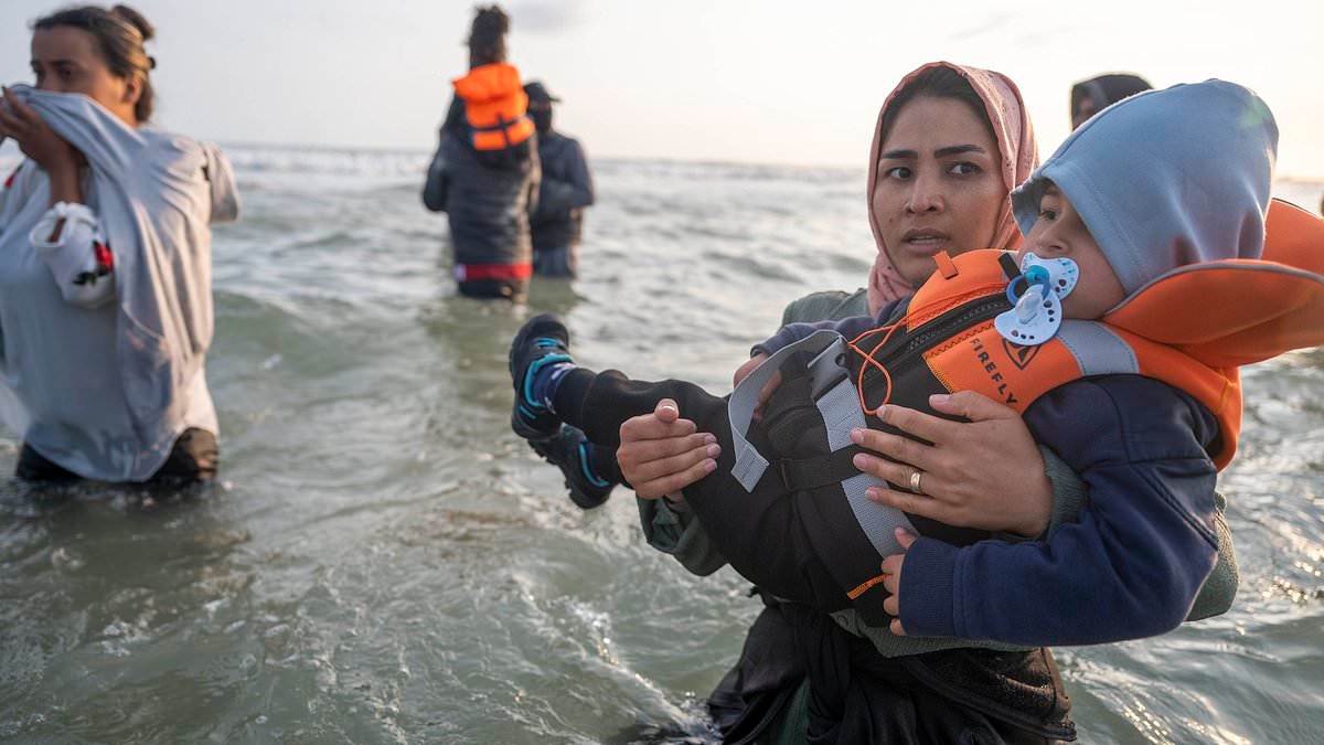 French police watch on hopelessly while huge groups of migrants - many carrying small children - set sail for Britain as Labour's one-in, one-out policy shows no sign of deterring illegal arrivals