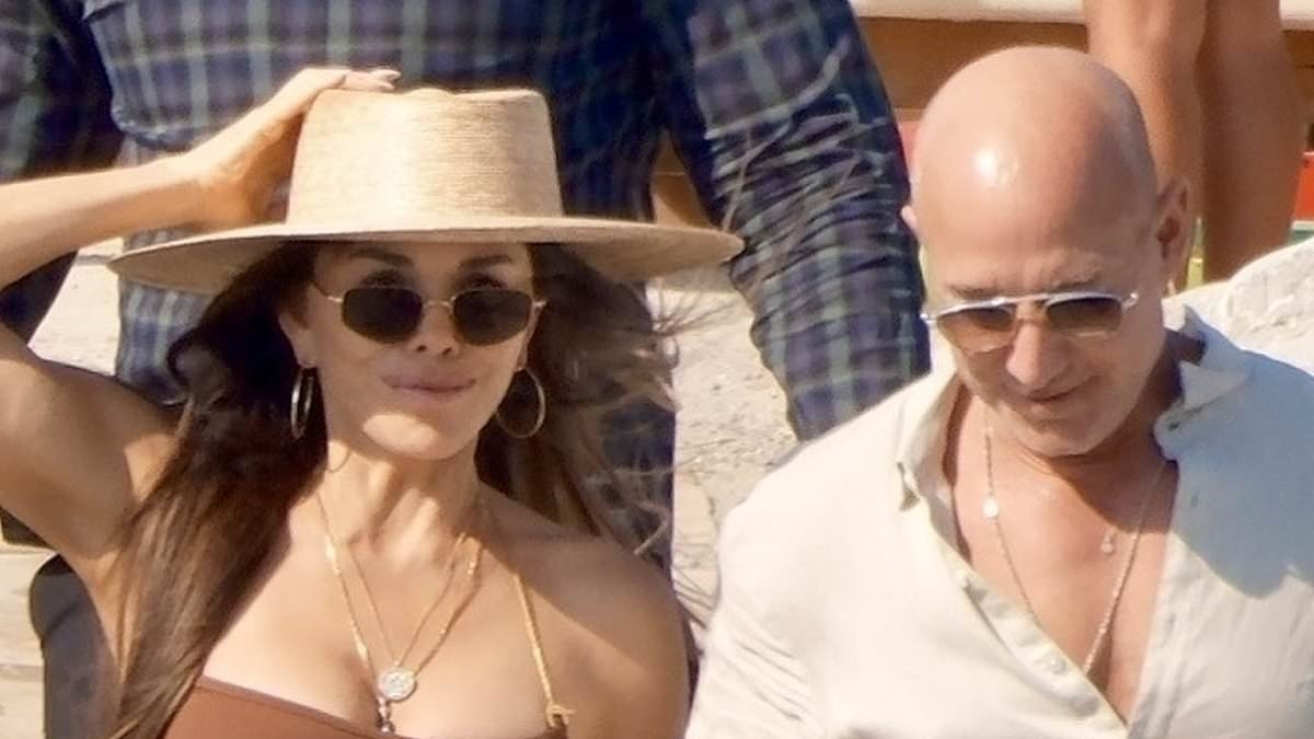 Lauren Sanchez ditches the heels after struggling to stay on her stiletto-clad feet during treacherous walk across a pebble beach - as she joins husband Jeff Bezos, Leonardo DiCaprio and Vittoria Ceretti for another double date in Ibiza