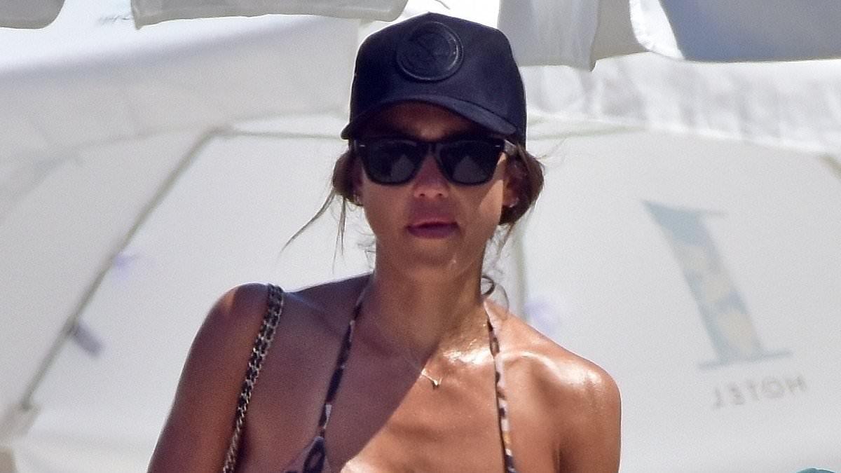 Bikini-clad Jessica Alba takes a break from hot romance as she spends time with family in Miami