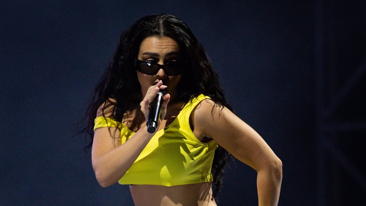 Charli XCX shows off her figure in a crop top and underwear to perform at Sziget Festival after wedding to The 1975 drummer George Daniel