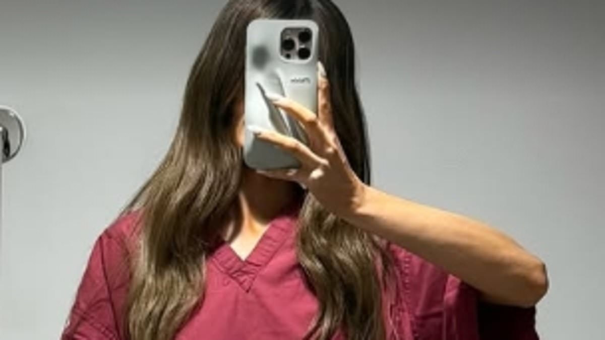 Maura Higgins, 34, poses for a mirror selfie in a red hospital gown before an MRI as her mystery injury is revealed