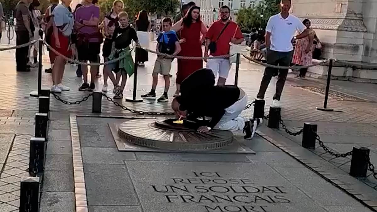 Outrage as man lights a cigarette using Tomb of the Unknown Soldier's eternal flame