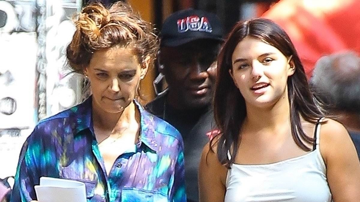 Katie Holmes' mini-me Suri, 19, beams on NYC movie set... before heading back to college in Pennsylvania