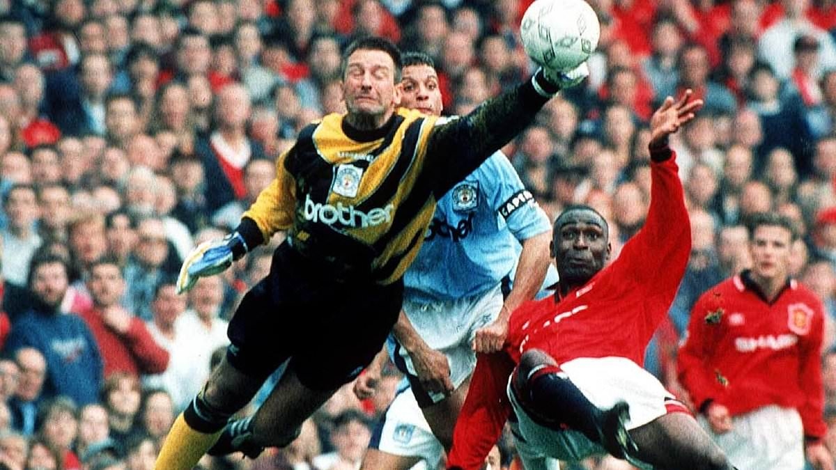 Former Man City and European Championship-winning goalkeeper 'sentenced to TWO YEARS in prison for more than 100 cases of fraud'