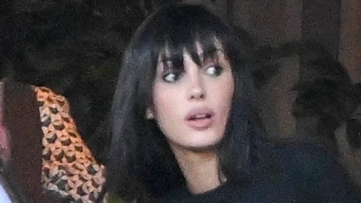 Kanye West's wife Bianca Censori covers up for stepmom duty as she takes rapper's kids out in LA