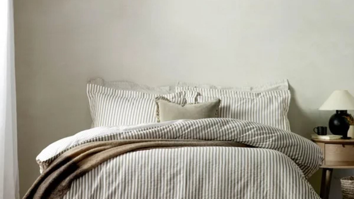 The SECRET to a high-end bedroom look on a budget: Why this £34 Dunelm stripe duvet cover set is turning heads - and it's on sale