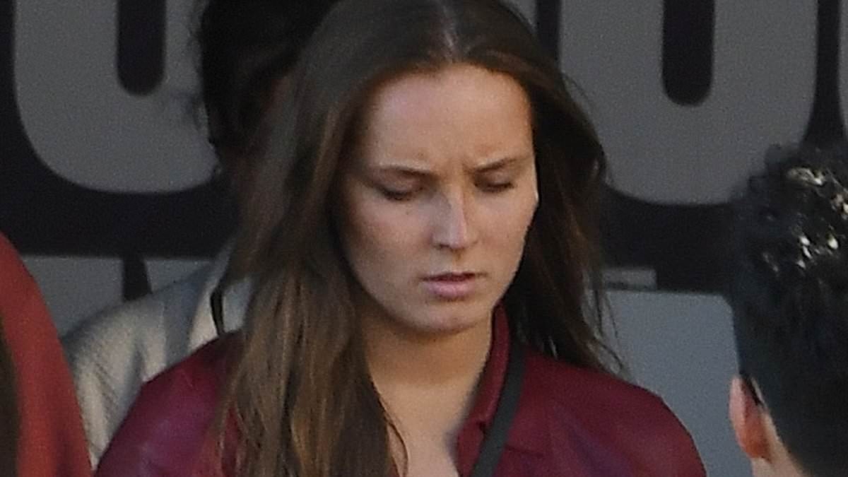Princess Ingrid Alexandra of Norway steps out in chic ensemble at Sydney Aquarium as she takes serious-looking phone call during study break
