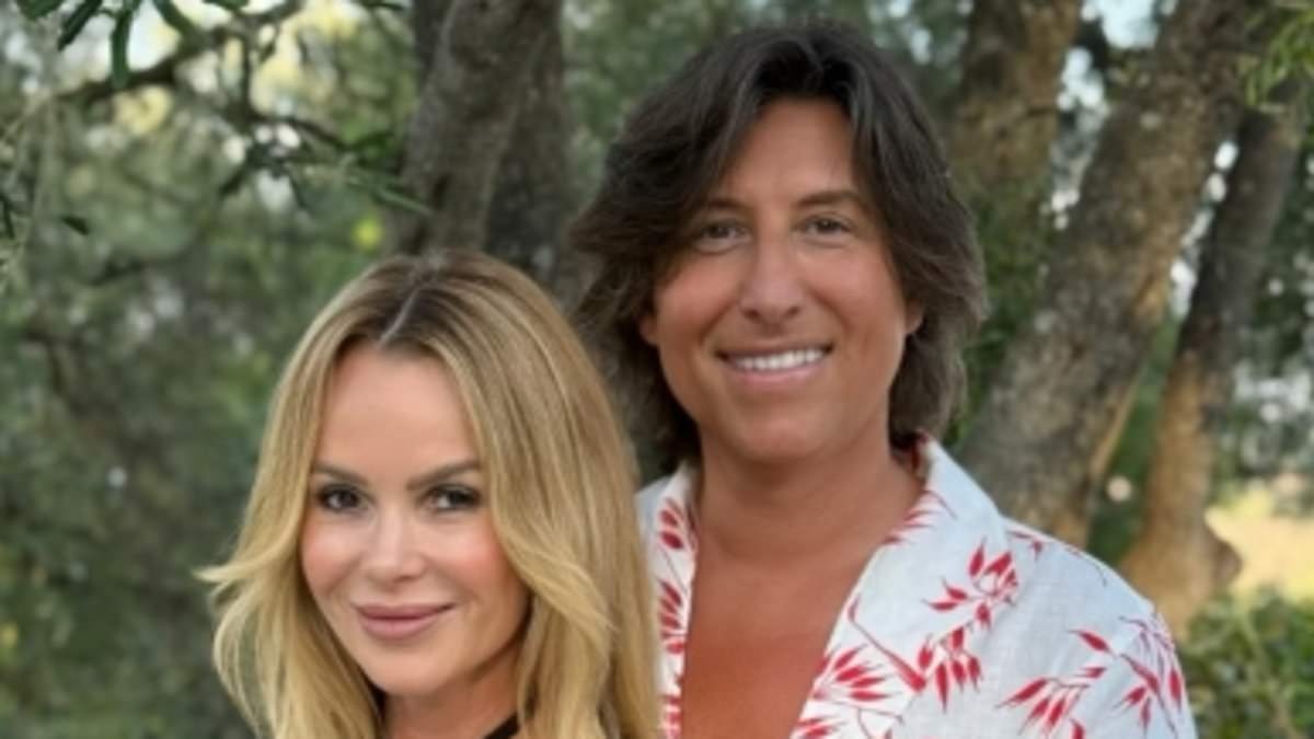 Amanda Holden, 54, dazzles alongside her youthful husband Chris Hughes, 51, in stunning snap 22 years after meeting... as fans marvel at the couple's aged-defying looks