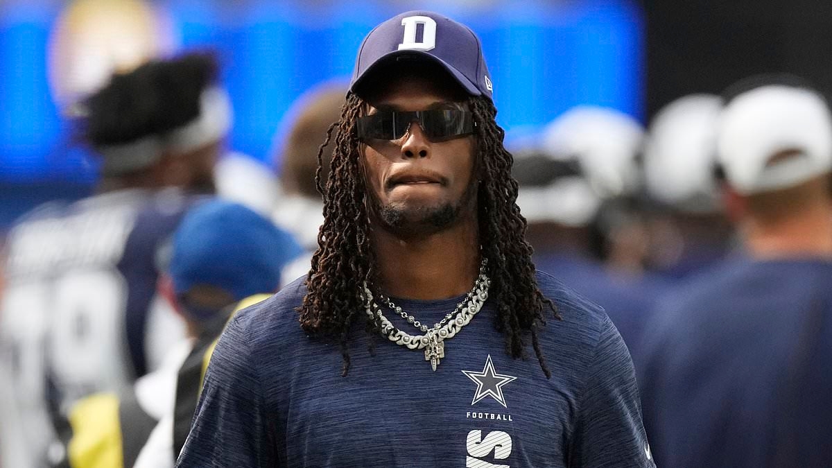 Inactive Cowboys star CeeDee Lamb is LEVELED by oncoming official while obliviously wandering along sideline