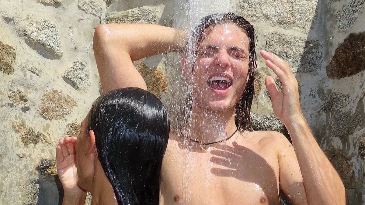 Damian Hurley strips off for shirtless outdoor shower snap with female pal while on holiday in Mykonos