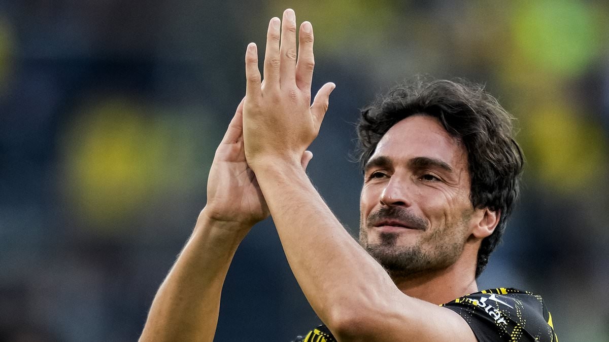 Mats Hummels' ex-wife complains their son, 7, 'wasn't invited' to his farewell match - while he celebrated with stunning model girlfriend 10 years his junior
