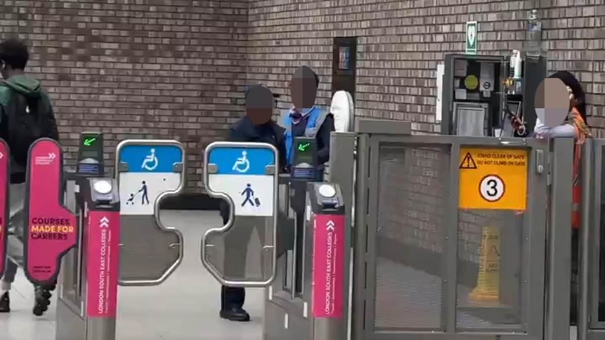 Moment staff on London's 'lawless' Tube appear to ignore two fare dodgers who shamelessly push their way through barriers next to where they are standing