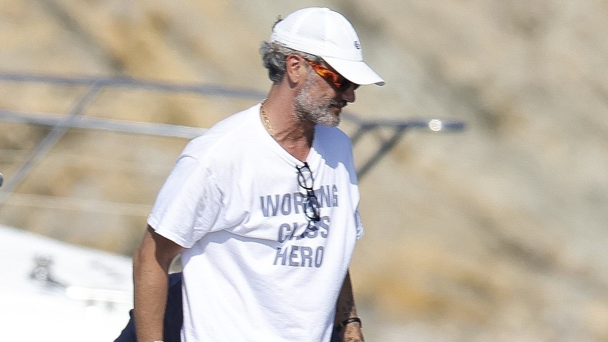 Rita Ora's husband Taika Waititi wears tone-deaf T-shirt on star-studded Ibiza trip for Chris Hemsworth's birthday