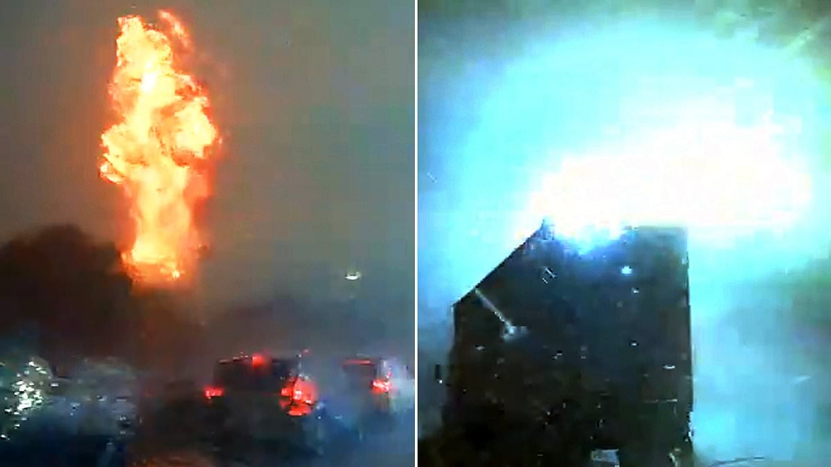 Terrifying moment lightning strike causes tower of flames in South Carolina as hurricane weather threatens US