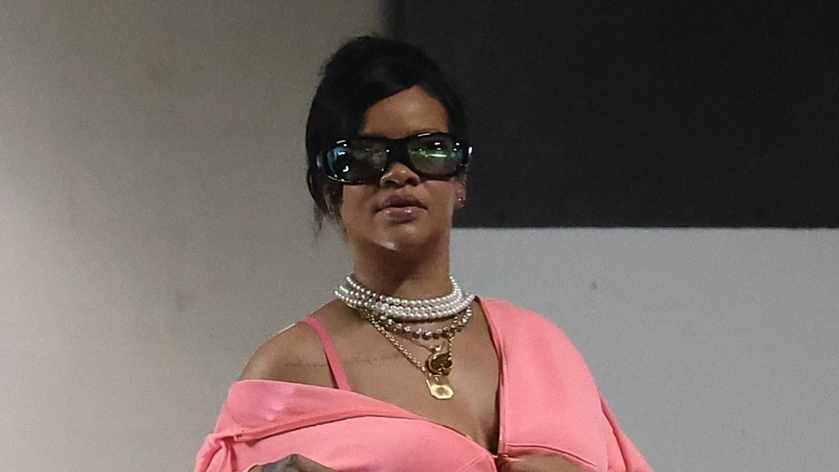 Rihanna shows off her growing bump in low-slung jeans with a cropped hoodie as she steps out in Beverly Hills