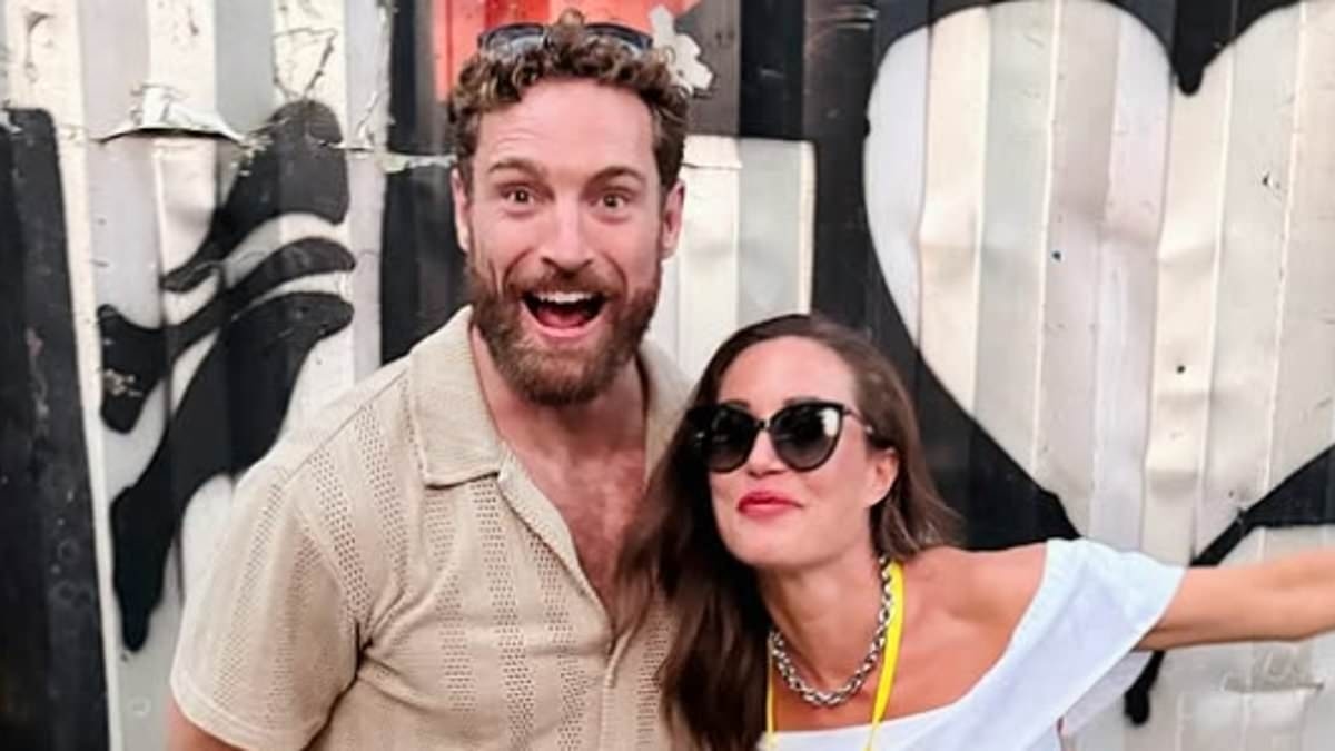 Finland's party-loving ex-prime minister Sanna Marin cosies up to 'British jiu jitsu medallist' during music festival - after divorcing her husband of 19 years