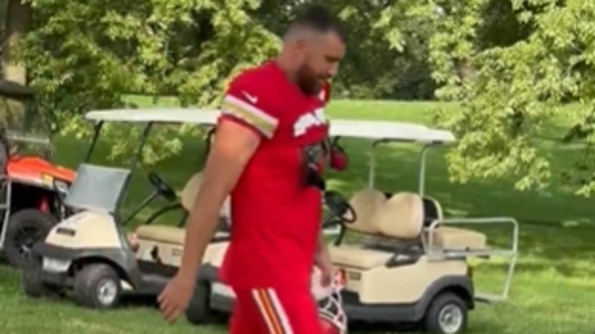 Travis Kelce walks out to Chiefs practice after helping Taylor Swift announce her new album on his podcast
