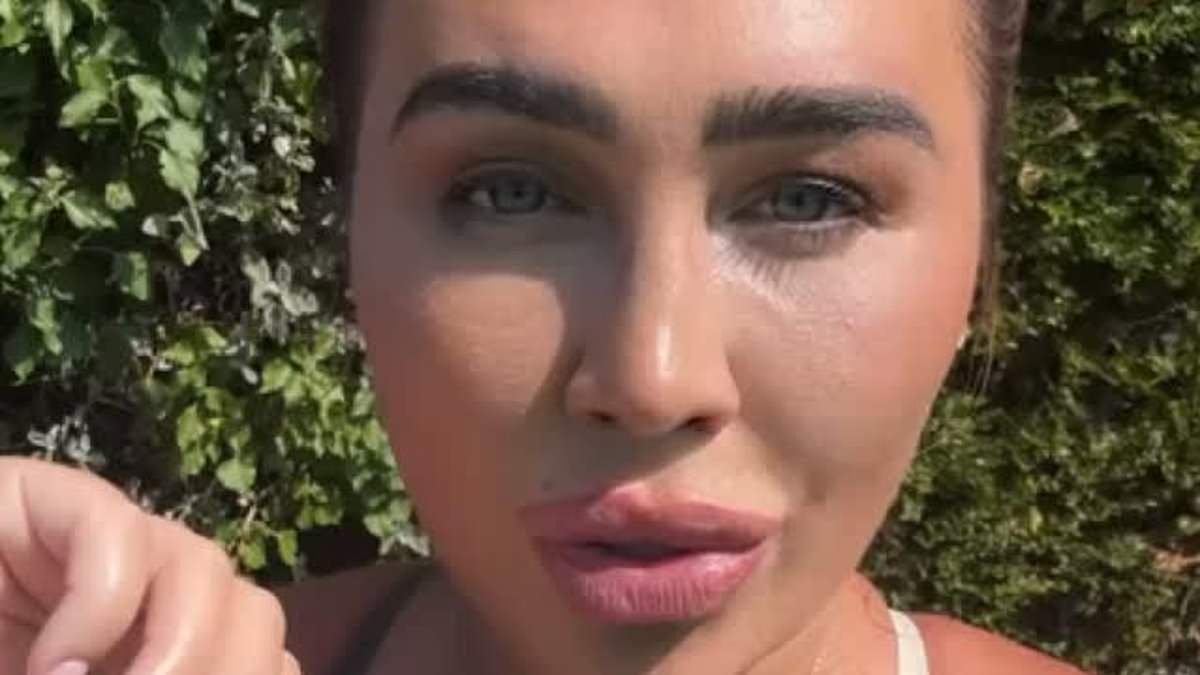 Lauren Goodger displays her sunburnt boobs in plunging bikini top as she flogs games to fans in her garden after sharing surgery regrets
