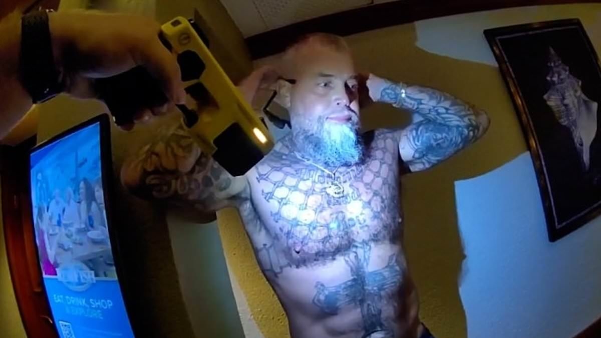 Heavily-tattooed Powerball winner filmed kicking cop in the FACE the day after scooping $163m jackpot