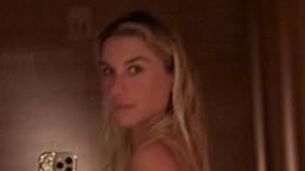 Kesha sets pulses racing as she strips off and flashes her cleavage in raunchy bathroom snaps