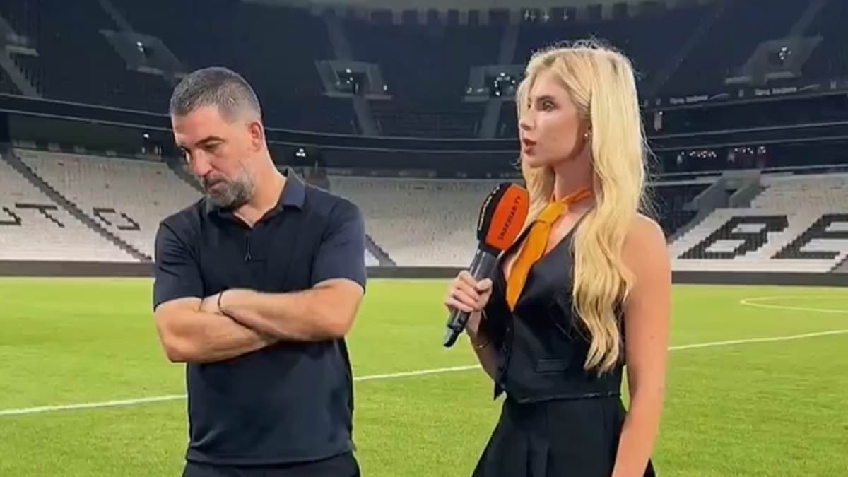 Married football manager's awkward interviews go viral as he desperately tries to avoid eye contact with stunning reporter