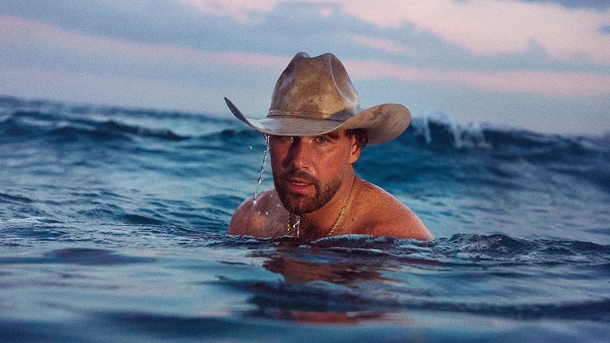 Travis Kelce posed shirtless for GQ to clap back at body shamers