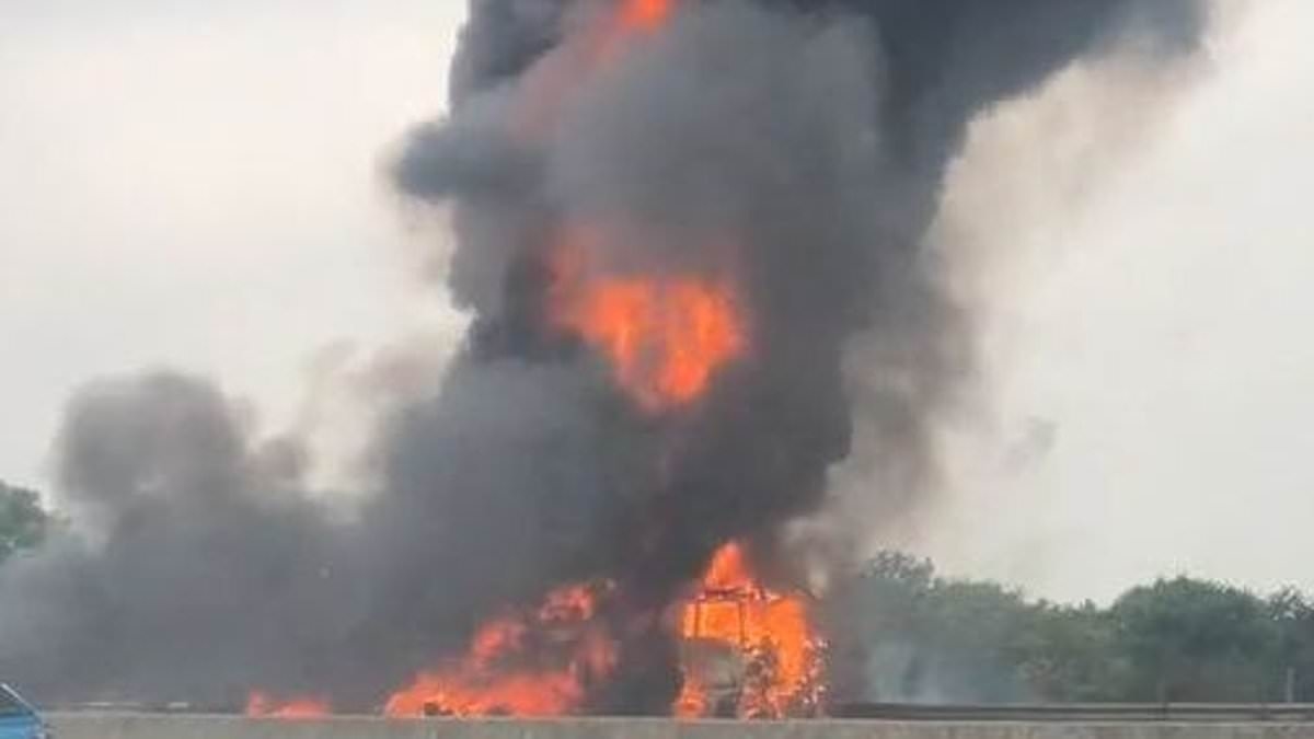Travel chaos as major motorway closes after lorry bursts into flames - causing miles of tailbacks