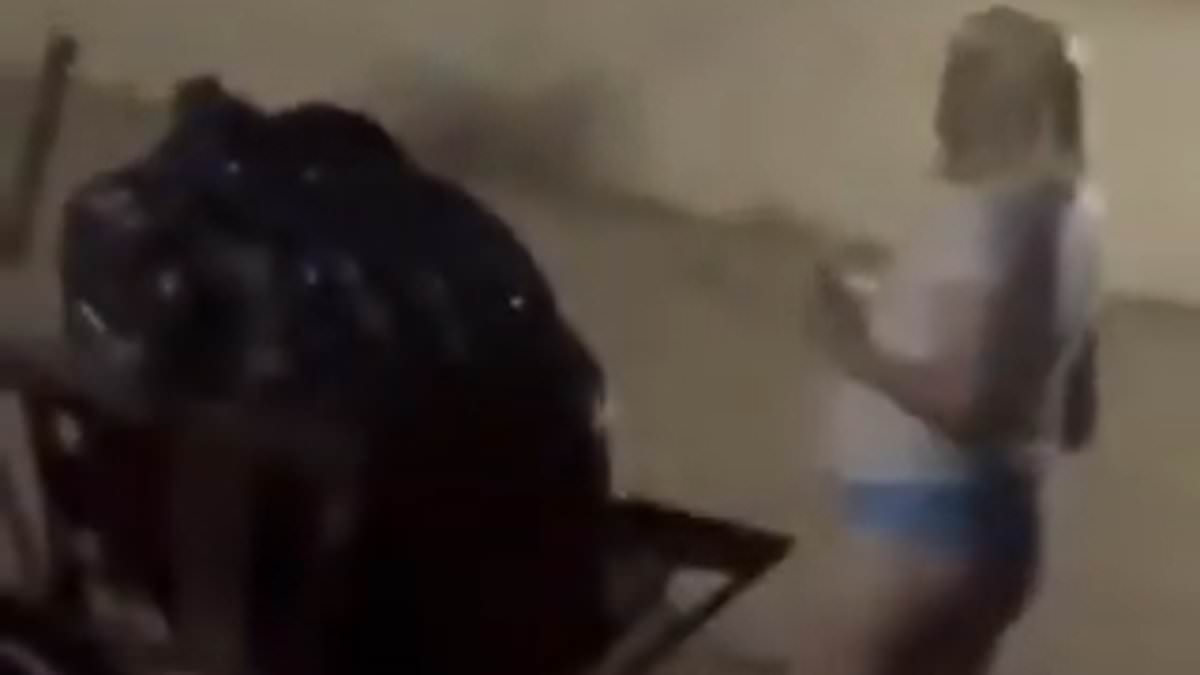 Pastor's unlikely excuse after he was caught on camera wearing a woman's wig and underwear