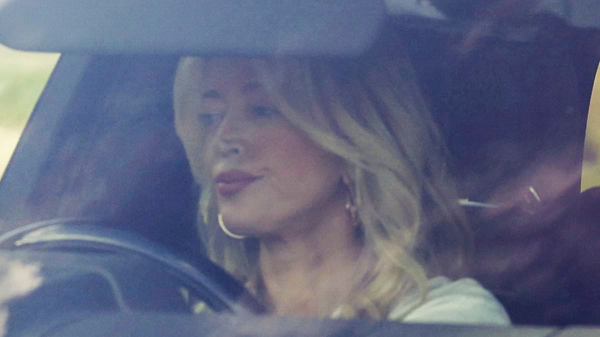 Jackie 'O' Henderson looks focused as she gets back behind the wheel of her luxury Range Rover after a nine month long driving suspension for breaking a simple road rule