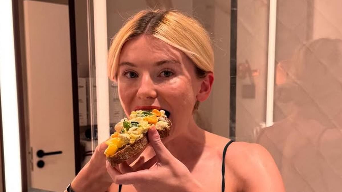 Georgia Toffolo displays her toned figure in a tiny bikini while munching on toast as she shows off her holiday outfits during Marbella trip