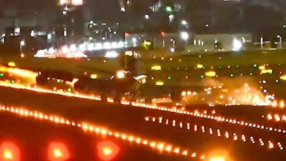 Terrifying moment Boeing 747 wing smashes into runway while landing during typhoon in Taiwan