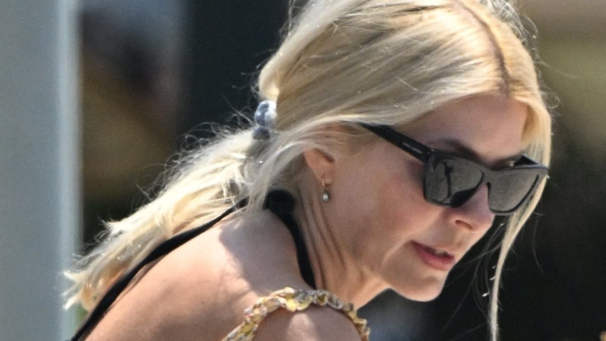 Holly Willoughby can't stop smiling during wholesome shopping trip in Portugal - after her former BFF Phillip Schofield was seen enjoying boozy afternoon with male pal